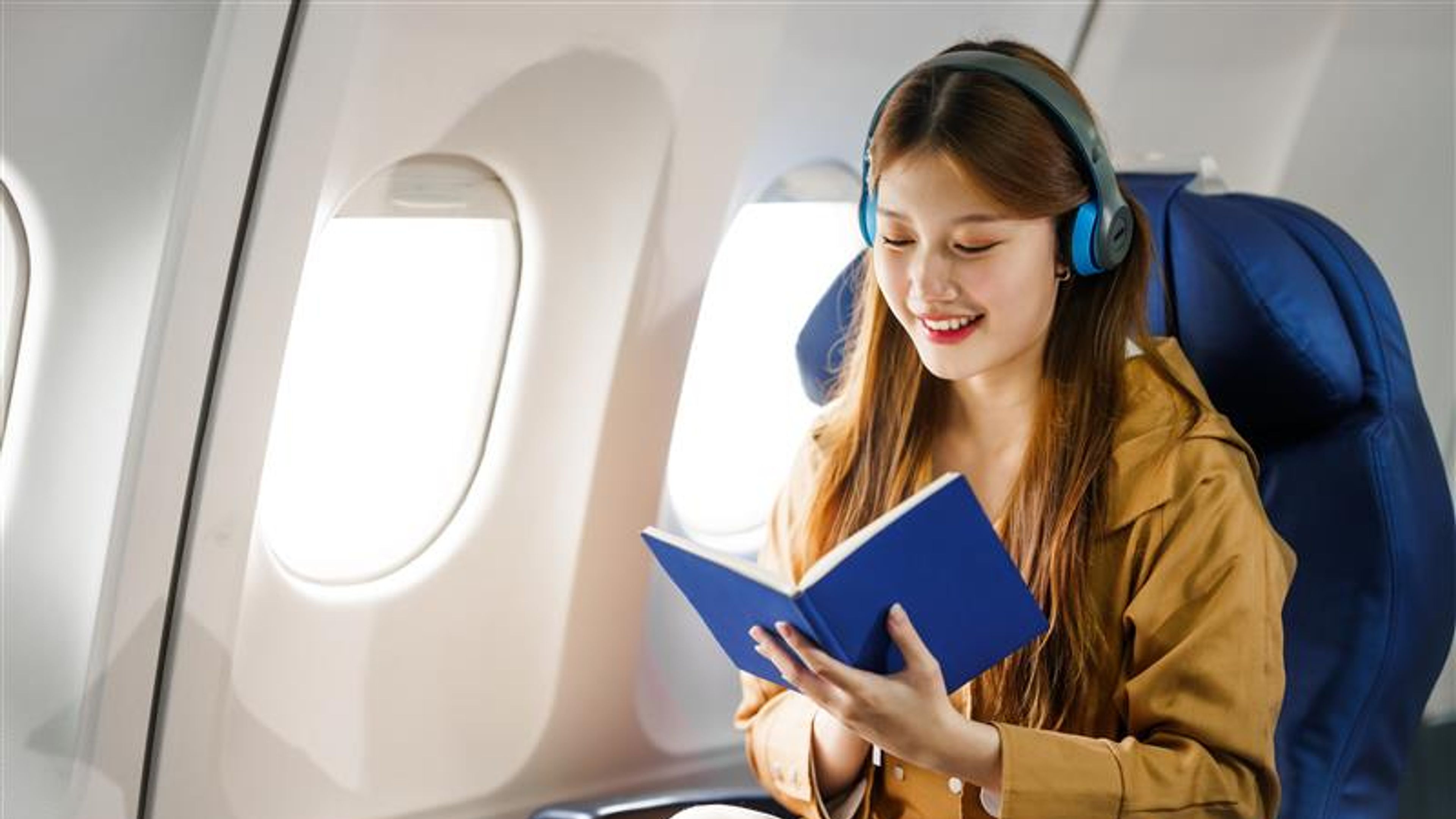 Asian girl in airplane