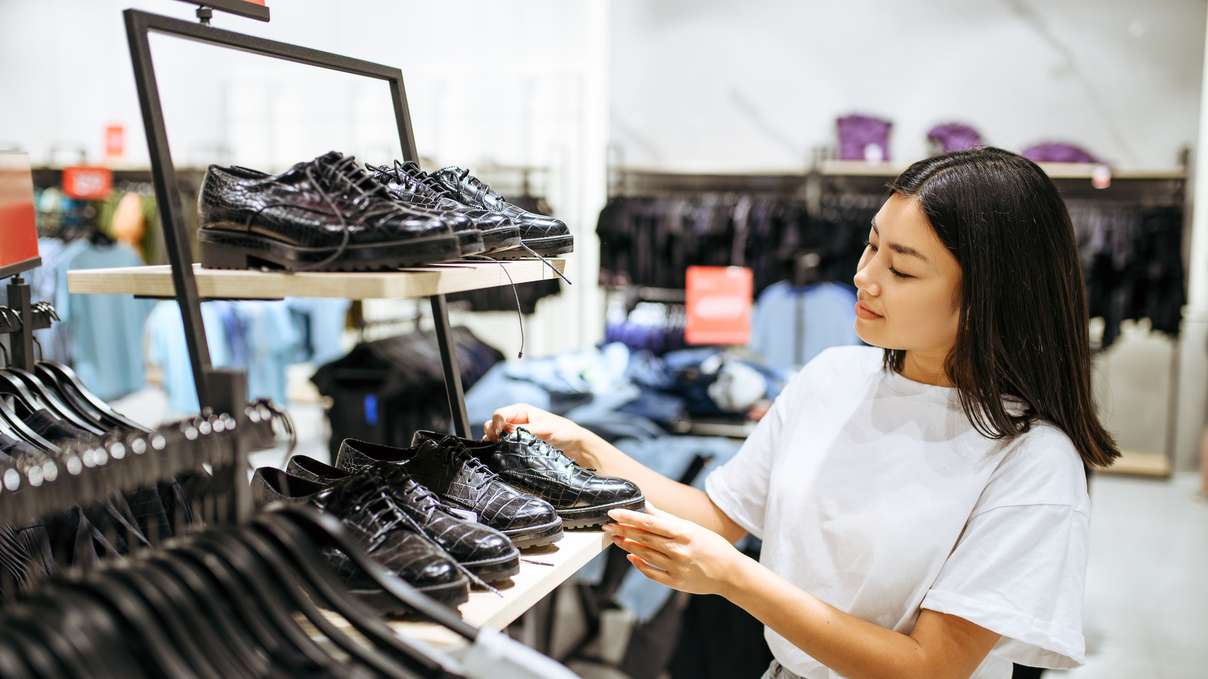 Young woman choosing shoes