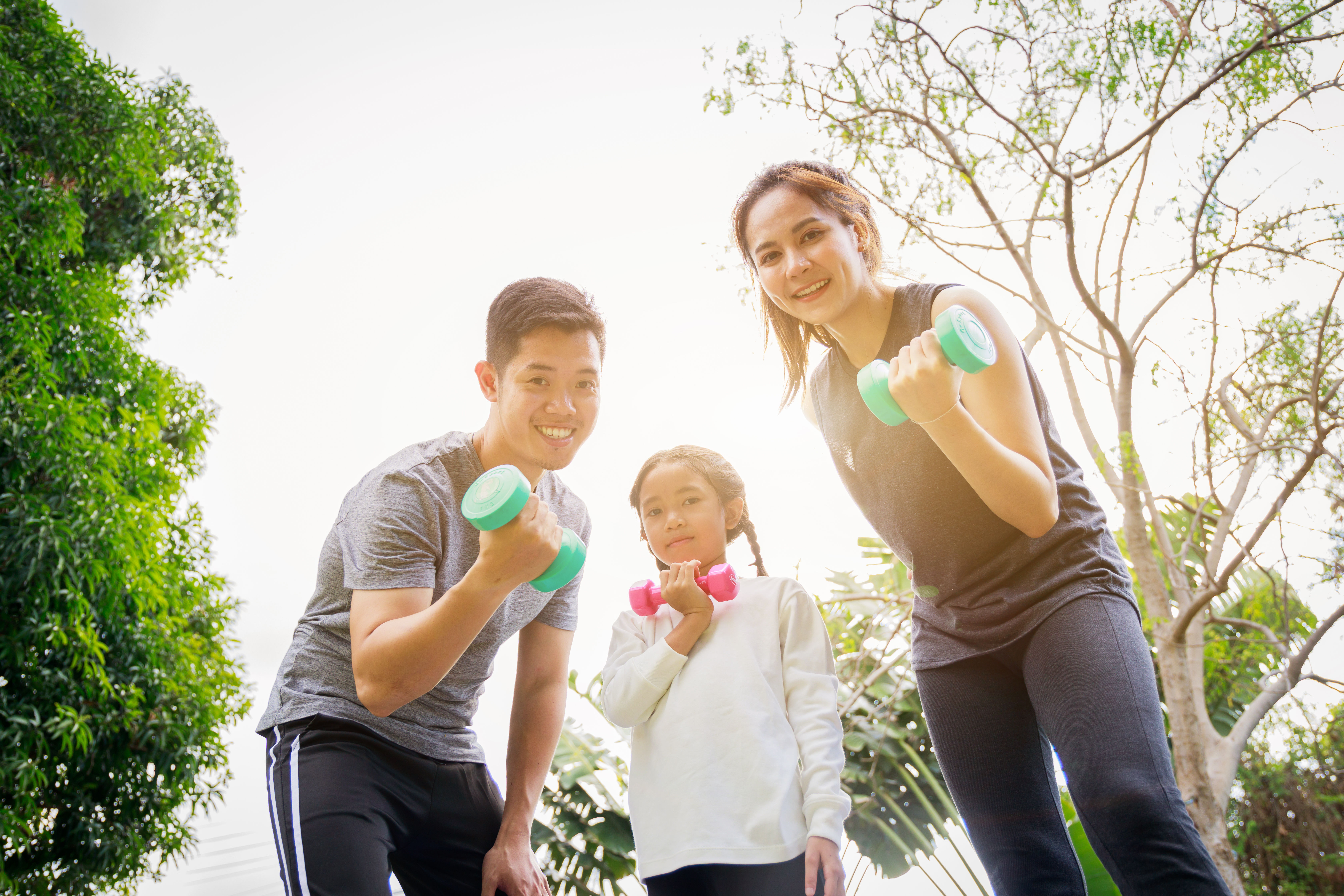 asian family exercising