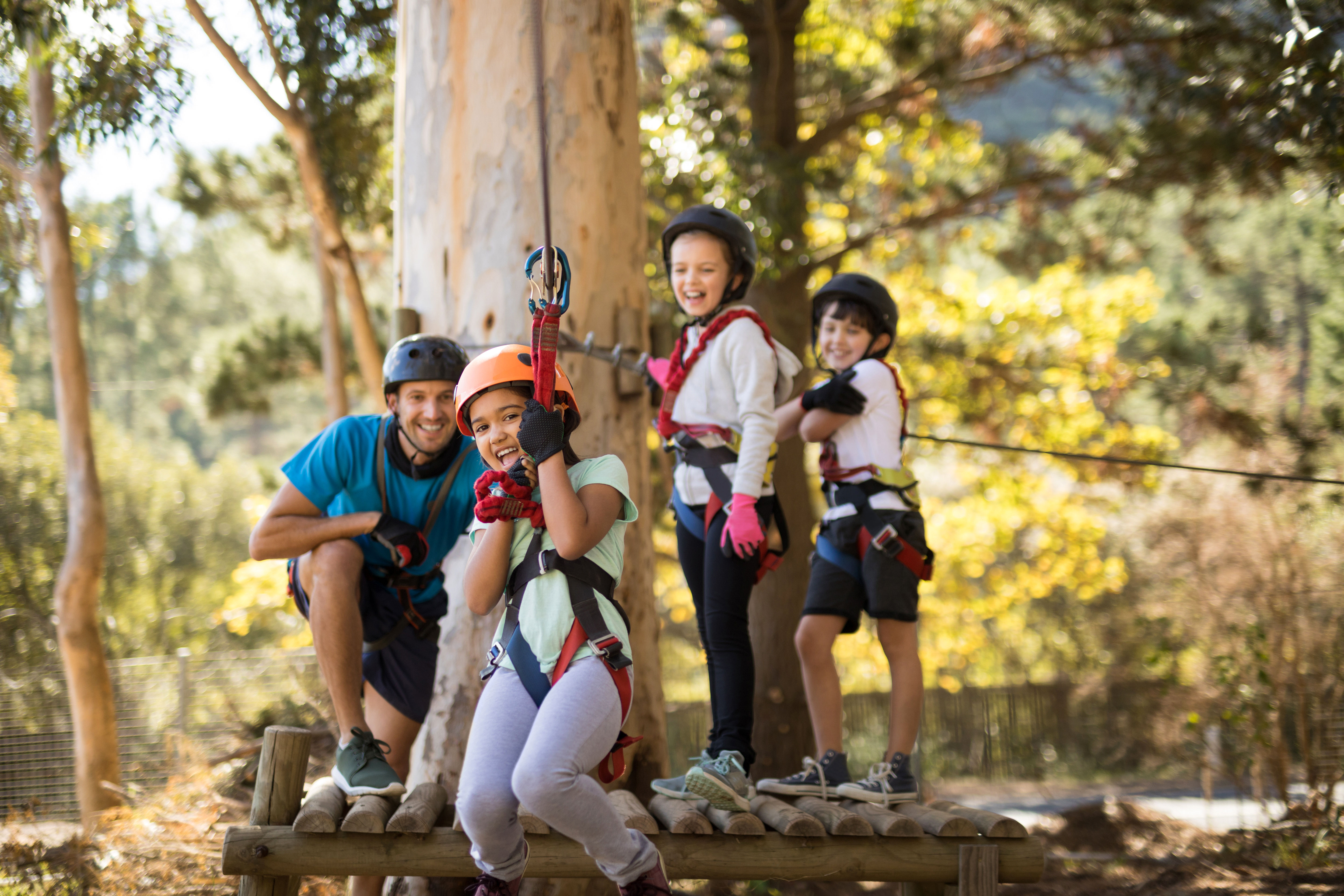 kids enjoying zipline 