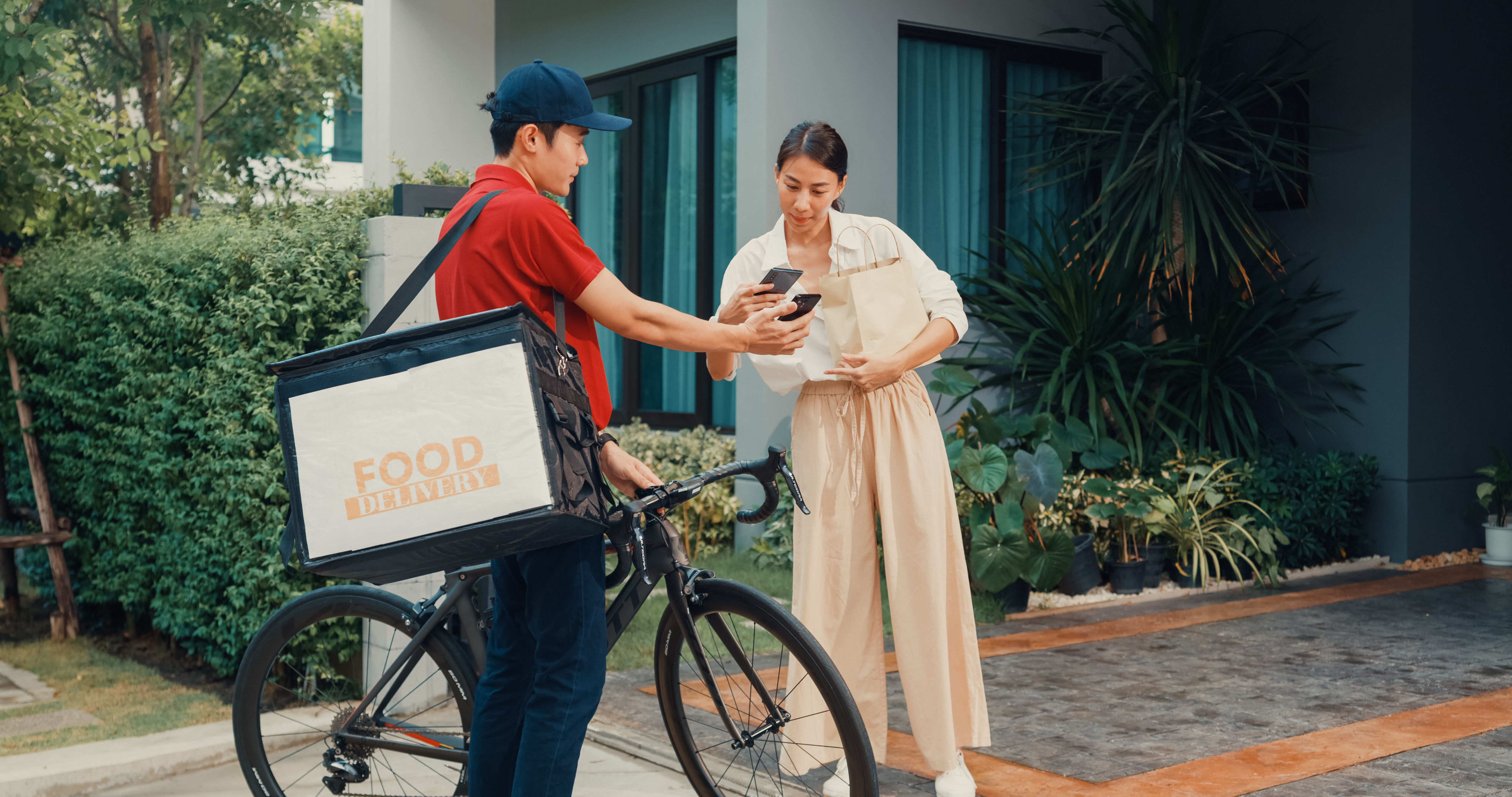 Woman receiving food delivery